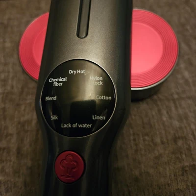 CreaseFree handle and dial with the pink press plate in the background